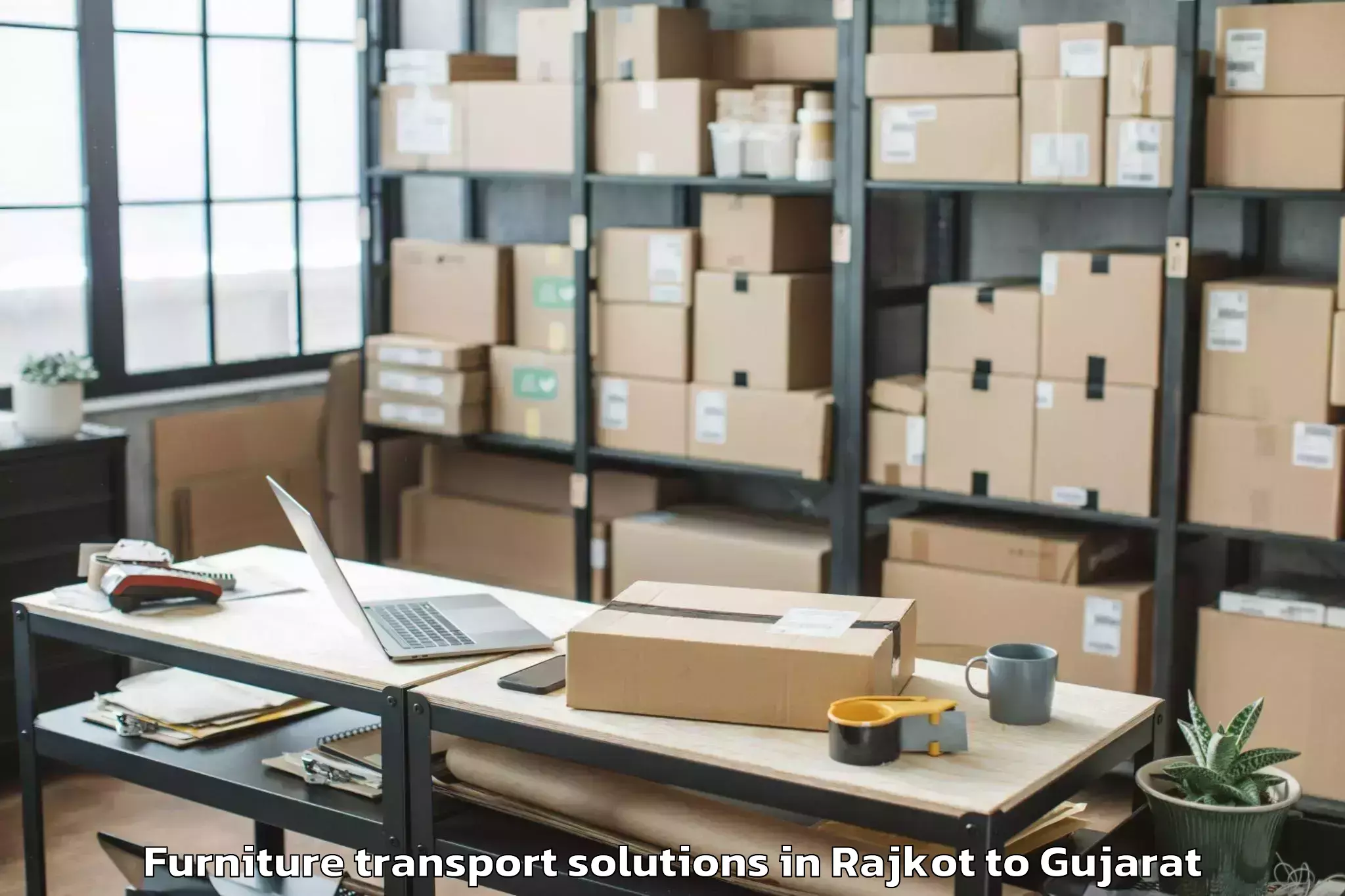 Leading Rajkot to Navrangpura Furniture Transport Solutions Provider